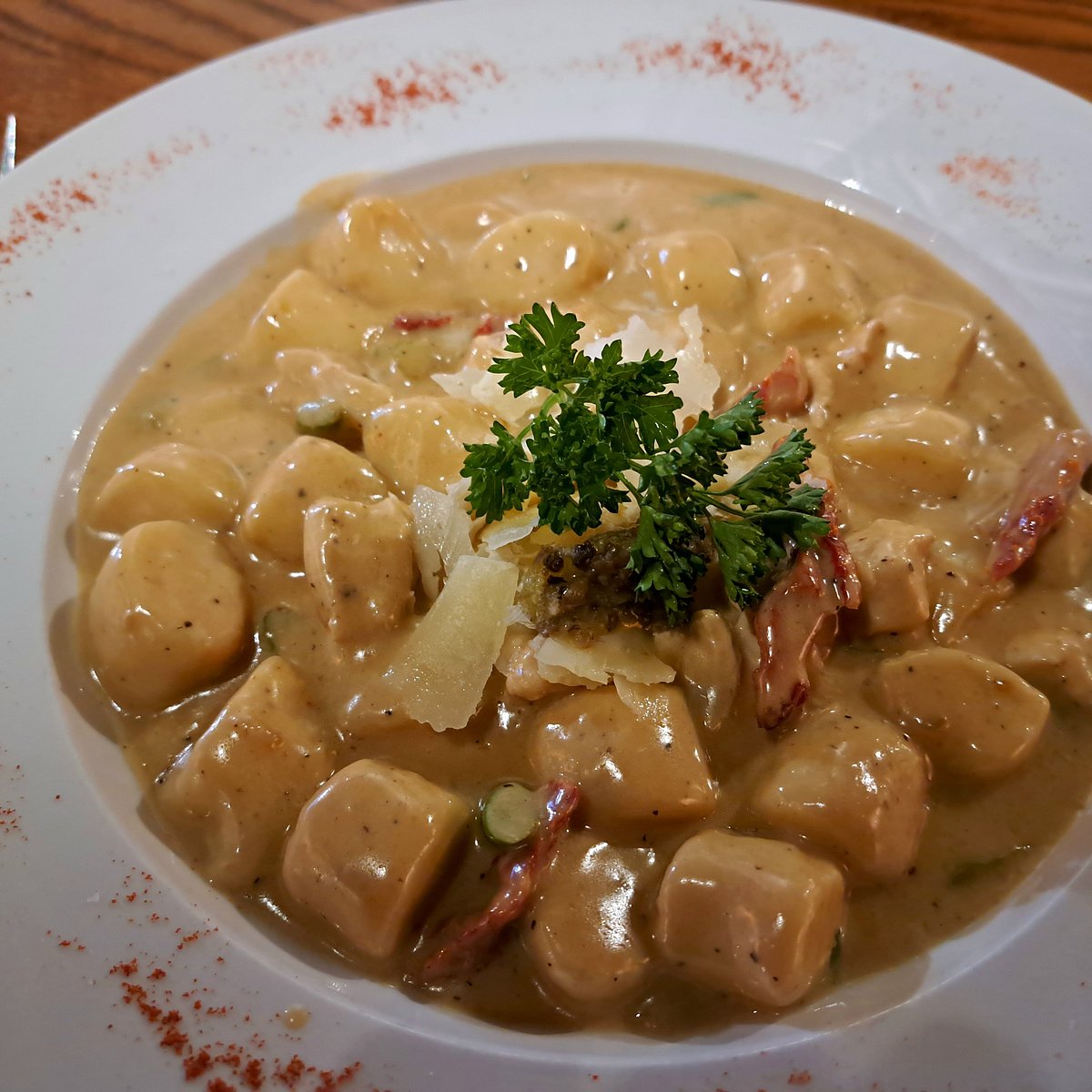 Casa Di Luigi signature dishes Gnocchi Norcina
Calamari Al Port Rosa
Tagliatelle in Agrodolce